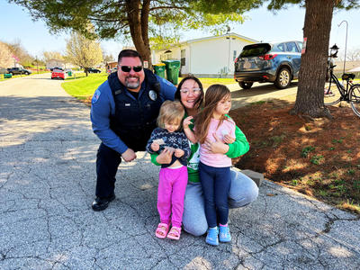male officer with family