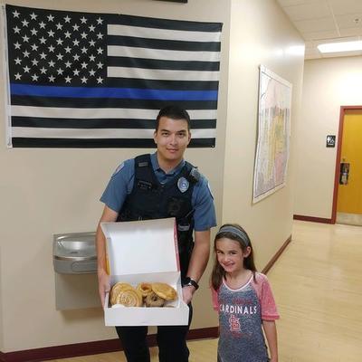 Male Police Officer with child